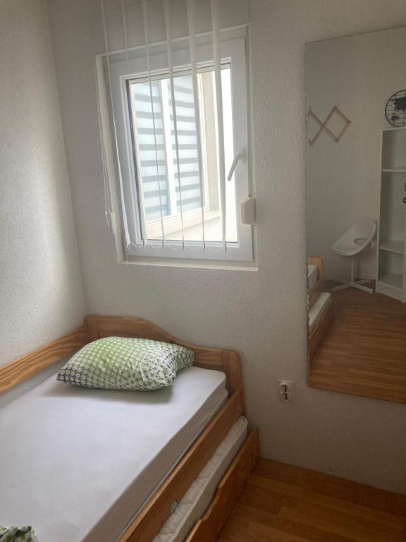 Postel nebo postele na pokoji v ubytování Quite beautiful apartment in the Split Neda with 4bedrooms