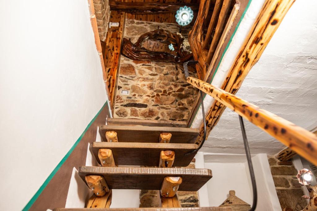 Fotografie z fotogalerie ubytování Sa dommu de su maistru 'e linna _SA SCANCìA_ v destinaci Baunei