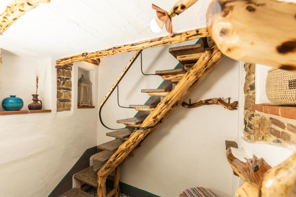 Fotografie z fotogalerie ubytování Sa dommu de su maistru 'e linna _SA SCANCìA_ v destinaci Baunei