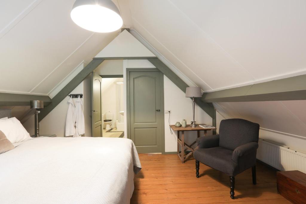 Postel nebo postele na pokoji v ubytování Lindenhof & Guesthouse
