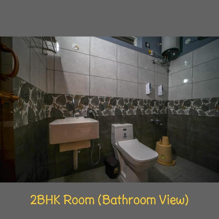 Vannituba majutusasutuses Mukhil Paradise Villa
