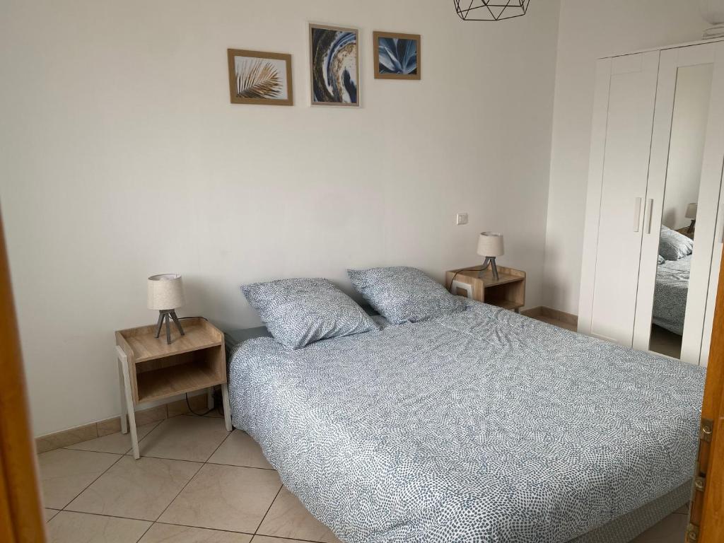 Postel nebo postele na pokoji v ubytování Gîte des Landes
