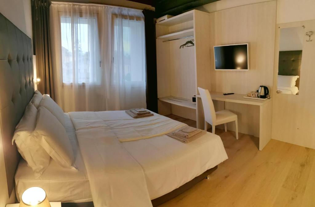 Posteľ alebo postele v izbe v ubytovaní Casa BORRIERO Farmhouse Charme B&B
