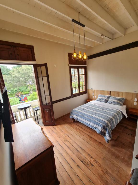 Postel nebo postele na pokoji v ubytování Flying Dog Lima B&B