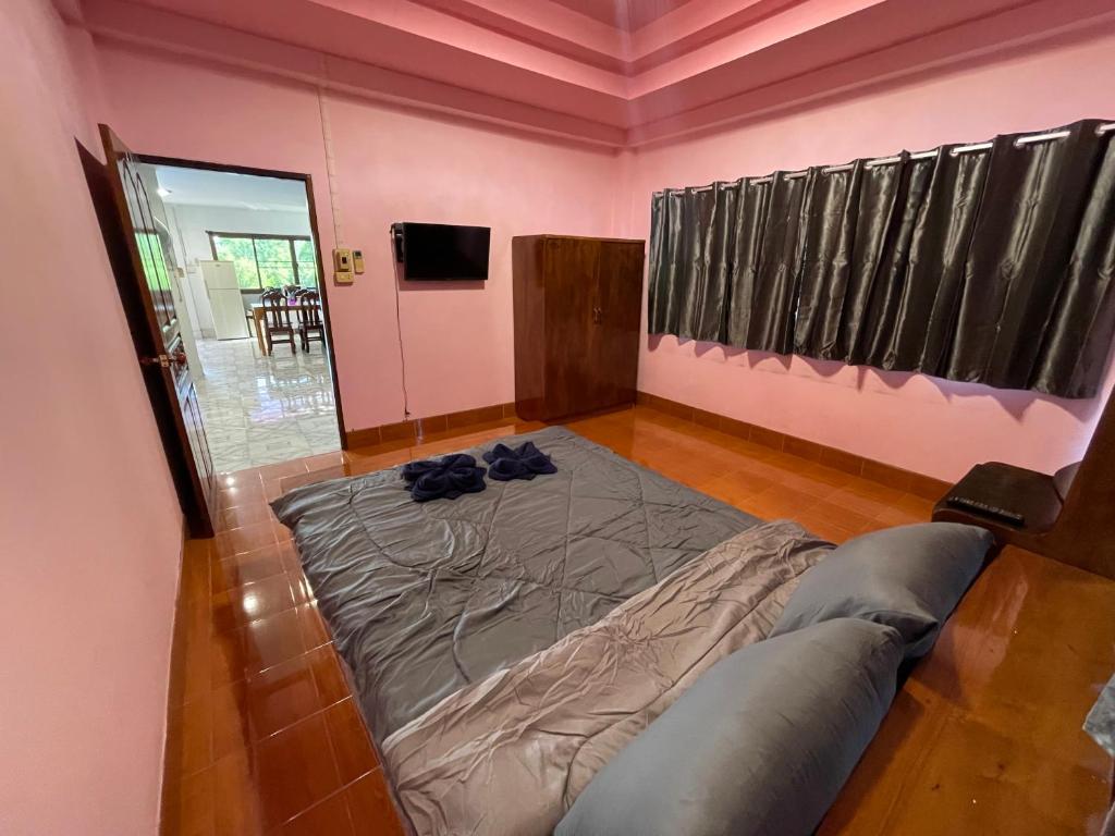 Postel nebo postele na pokoji v ubytování UT HOME
