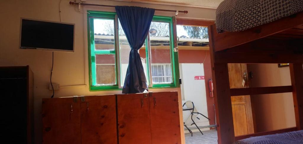 TV a/nebo společenská místnost v ubytování Hostal Michel