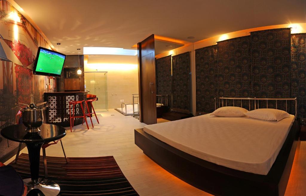 TV a/nebo společenská místnost v ubytování Gran Motel Dubai