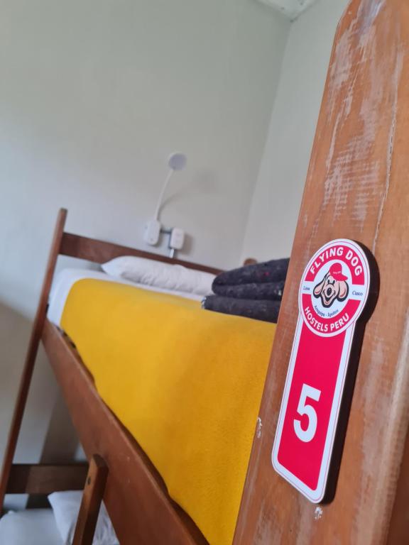 Postel nebo postele na pokoji v ubytování Flying Dog Lima B&B