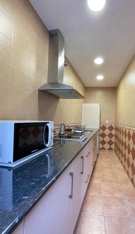 Kuchyňa alebo kuchynka v ubytovaní LaFrenchTouch - Escapada rural en una coqueta casa