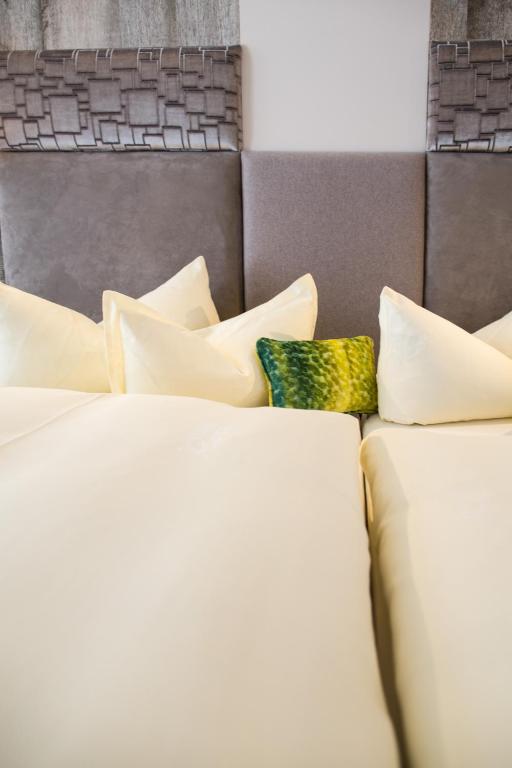 Postel nebo postele na pokoji v ubytování Hotel Rita