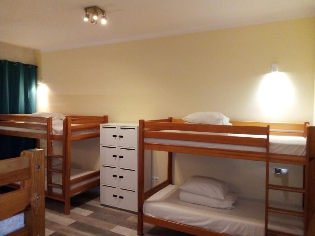 Postel nebo postele na pokoji v ubytování Chmielna 5 Rooms & Apartments