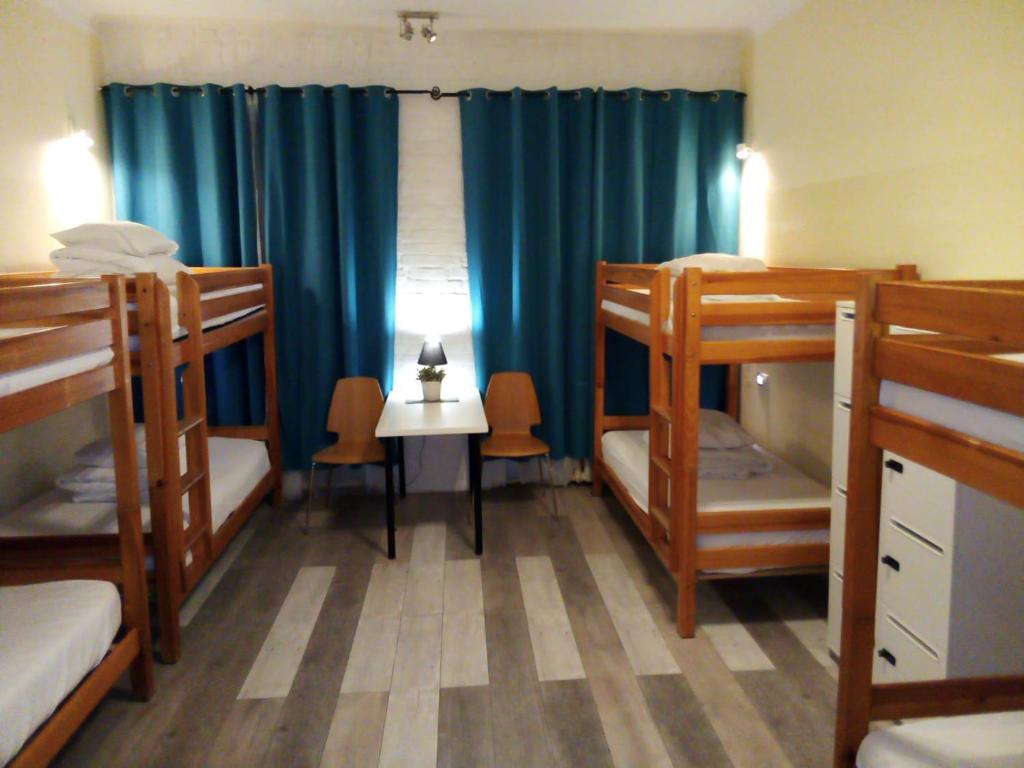 Postel nebo postele na pokoji v ubytování Chmielna 5 Rooms & Apartments