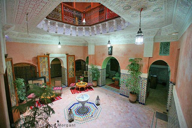 a large room with a living room with at Riad Essaoussan in Marrakech
