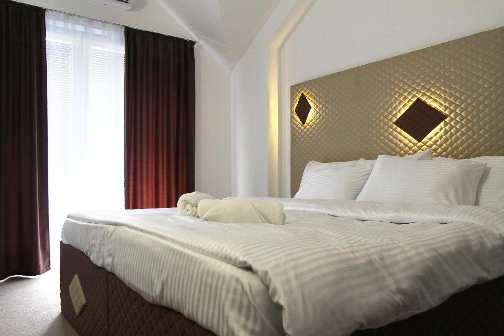 Postel nebo postele na pokoji v ubytování Hotel Andalus