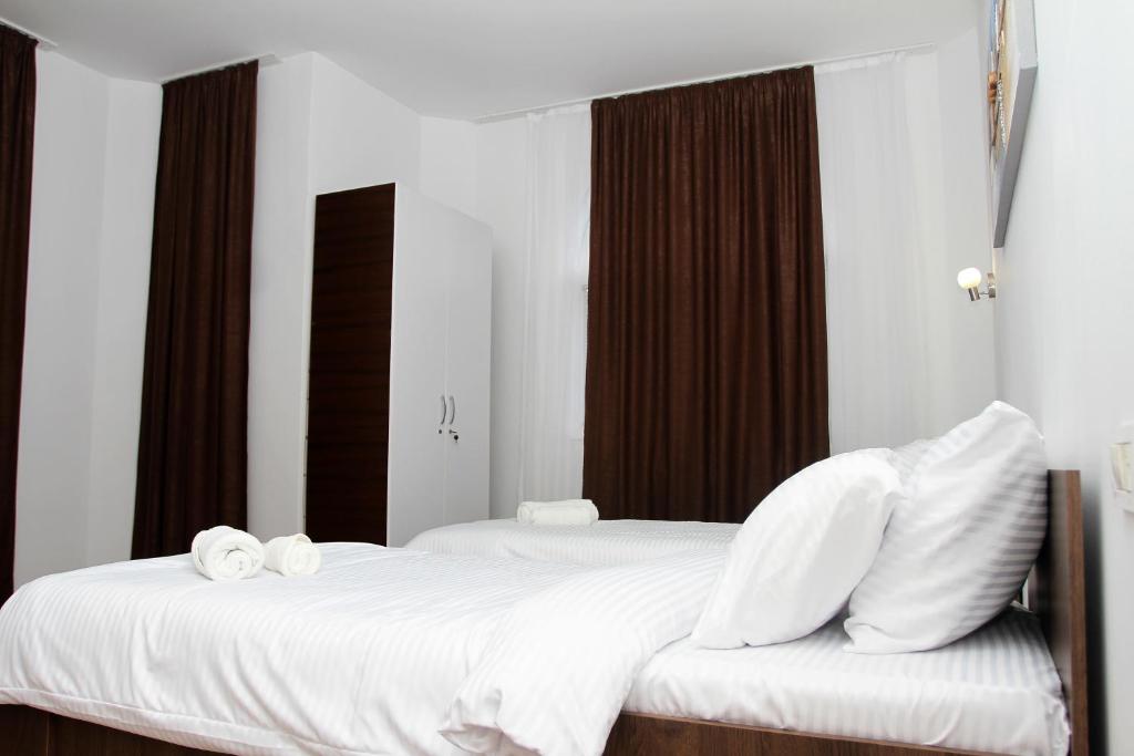 Postel nebo postele na pokoji v ubytování Hotel Andalus