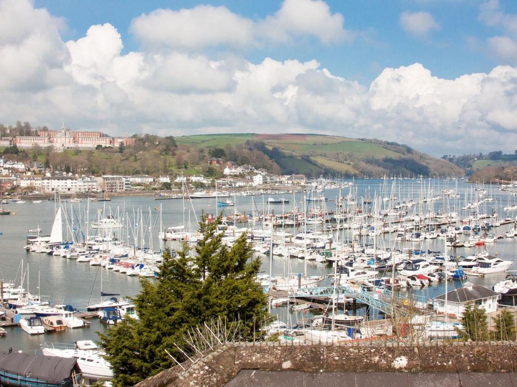 a bunch of boats docked in a harbor at College View 2 Upper in Kingswear