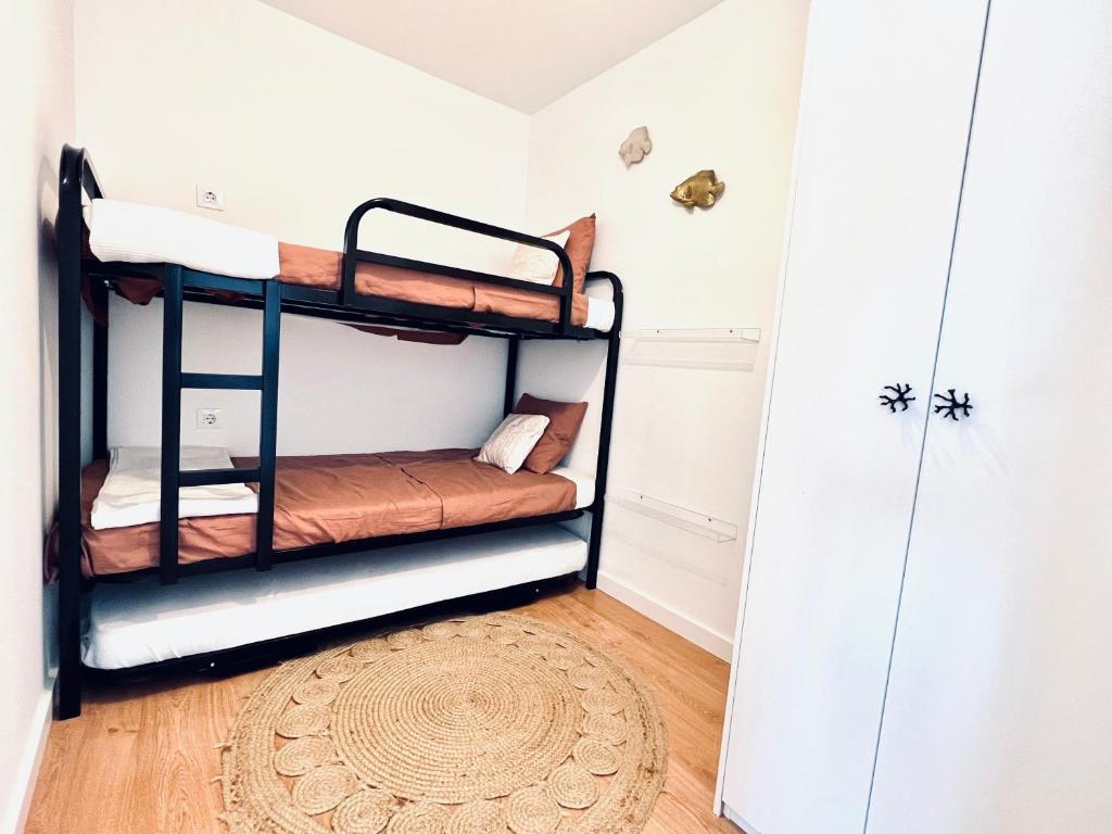 Postel nebo postele na pokoji v ubytování ZEN Apartment sea views