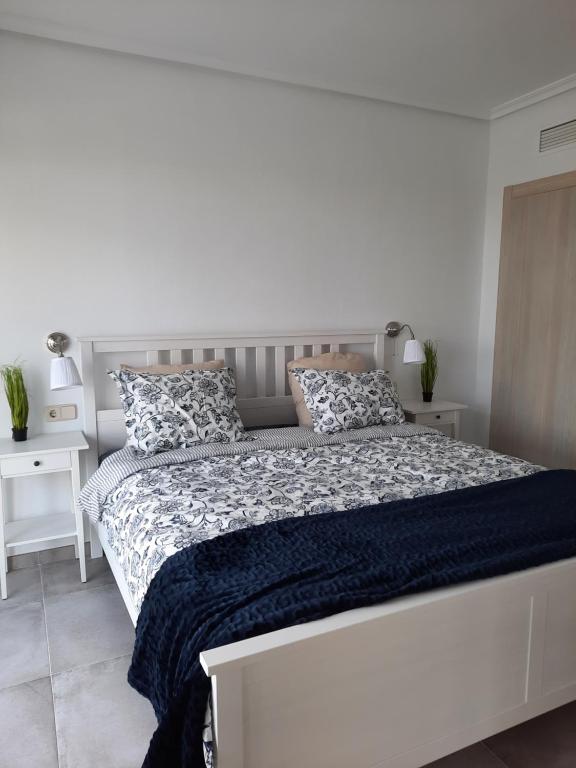 Posteľ alebo postele v izbe v ubytovaní Apartment in Xeresa del Monte, Sea, Mountain,terrace, pools