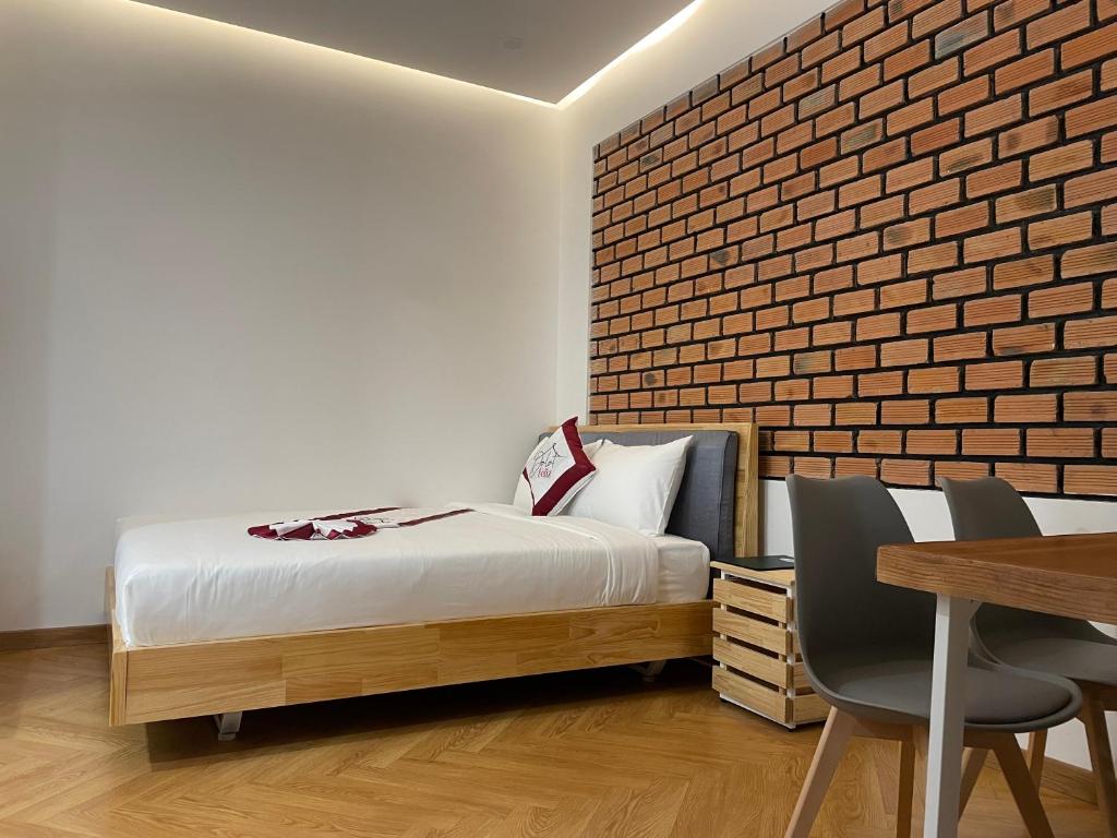 Giường trong phòng chung tại Feliz Dalat Homestay