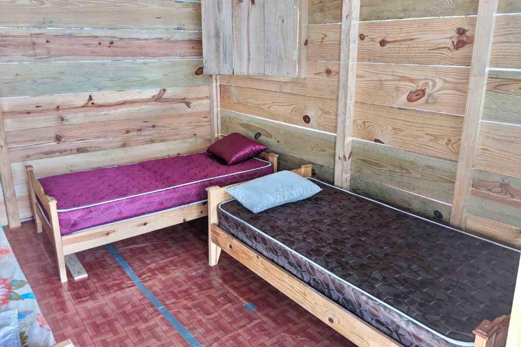 Postel nebo postele na pokoji v ubytování Private Over-Water Cabin on paradise San Blas island