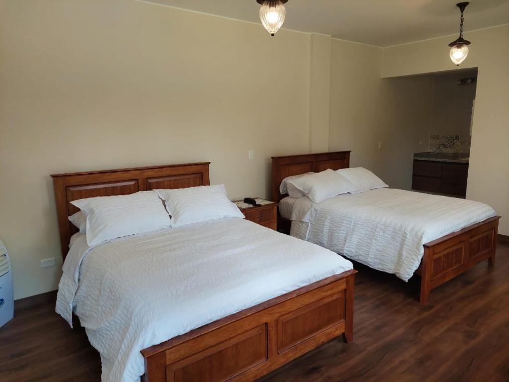 Postel nebo postele na pokoji v ubytování Quinta San Felipe