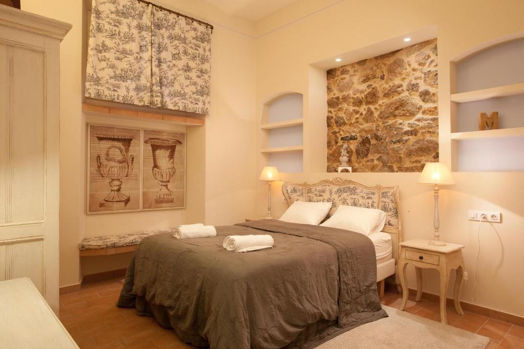 Posteľ alebo postele v izbe v ubytovaní Romantic In Trendy Gracia