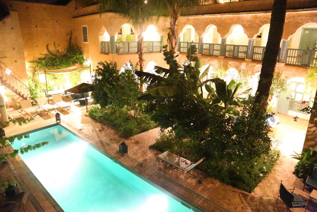 an overhead view of a swimming pool in a building at Palais Oumensour in Taroudant