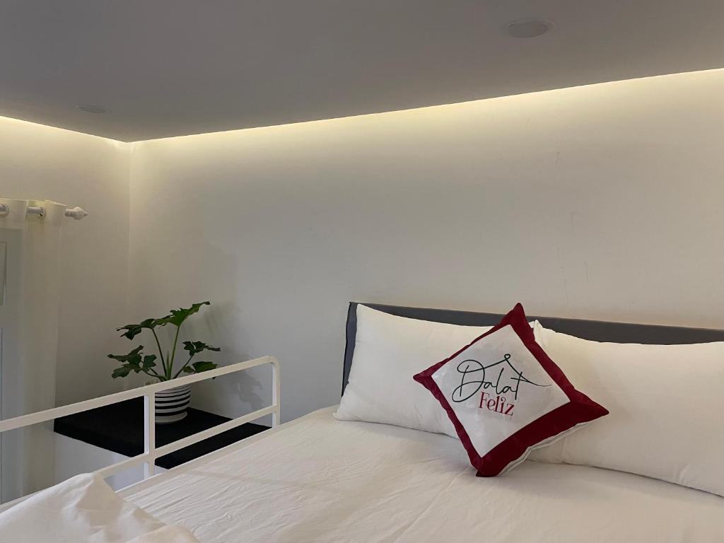 Giường trong phòng chung tại Feliz Dalat Homestay