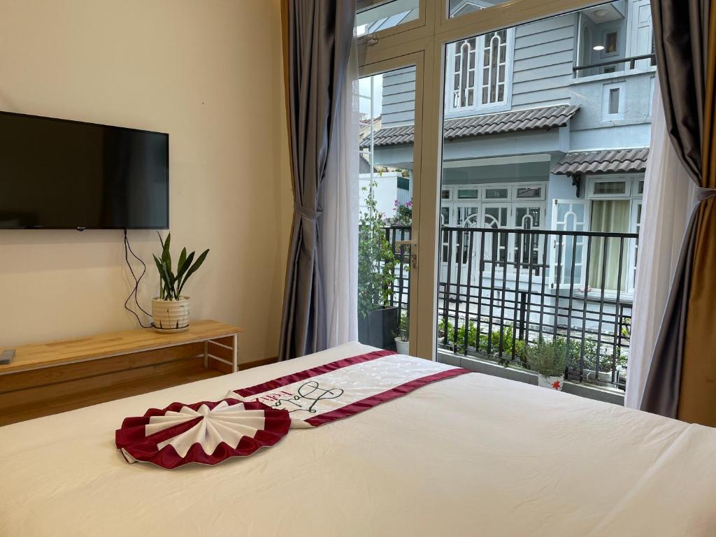 Giường trong phòng chung tại Feliz Dalat Homestay