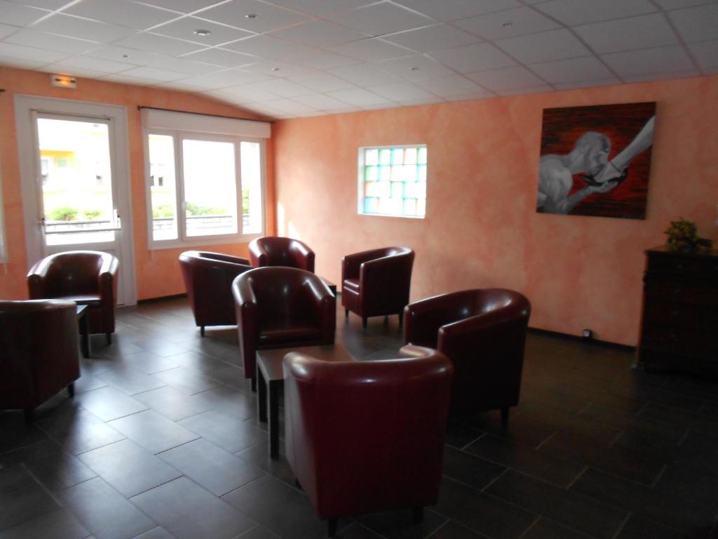 Posezení v ubytování Hotel Les Sapins