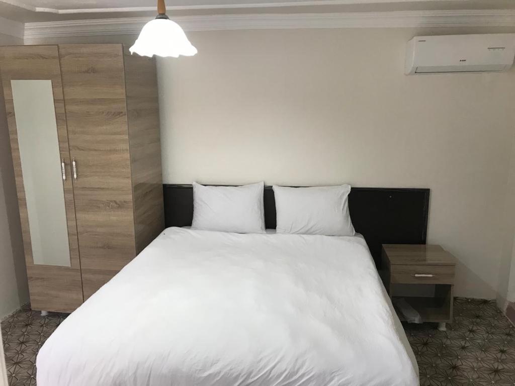 Postel nebo postele na pokoji v ubytování KARADUT PENSION NEMRUT