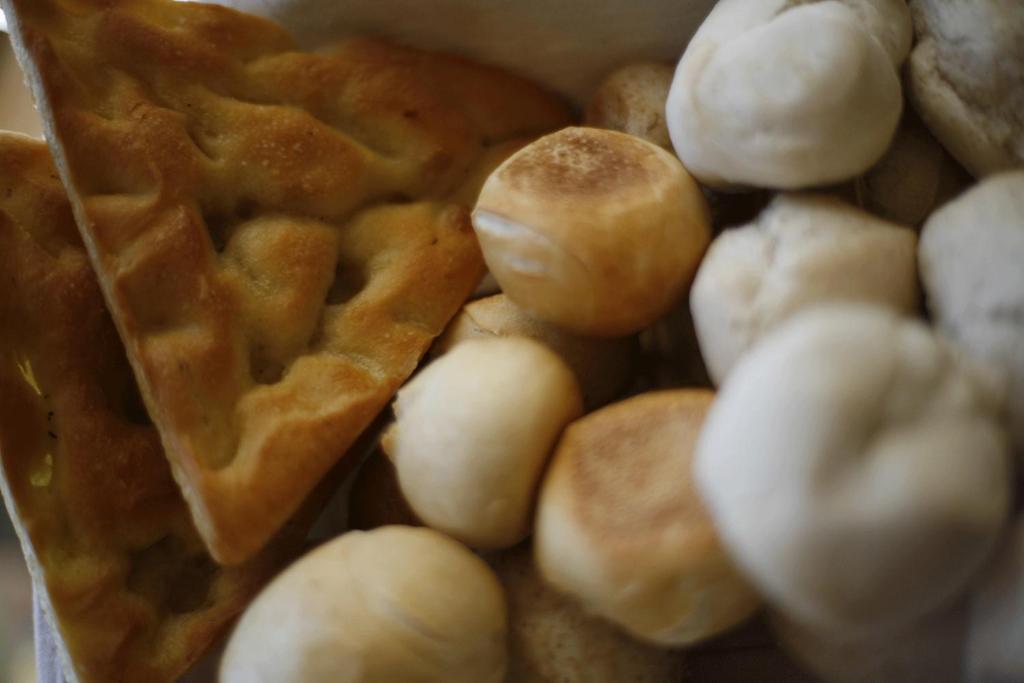 a pile of waffles and other food items at Hotel Florida Lerici in Lerici
