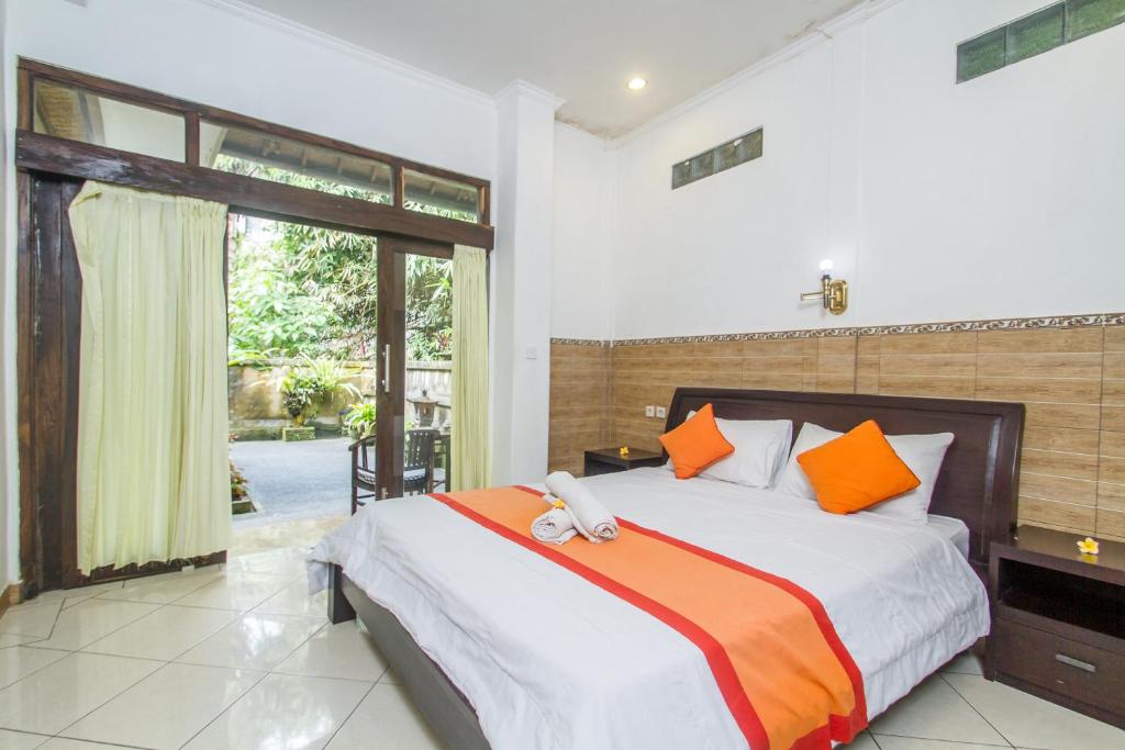 Postel nebo postele na pokoji v ubytování Sulendra Jungle Suites Ubud View by EPS
