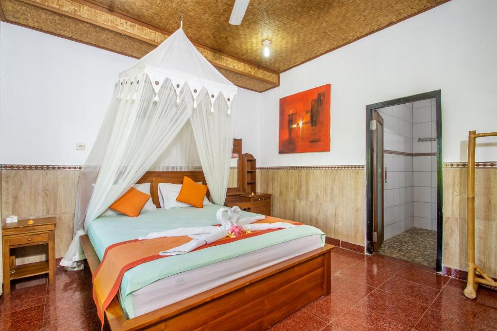 Postel nebo postele na pokoji v ubytování Sulendra Jungle Suites Ubud View by EPS
