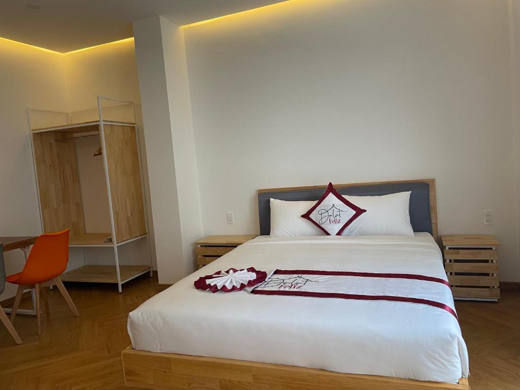 Giường trong phòng chung tại Feliz Dalat Homestay