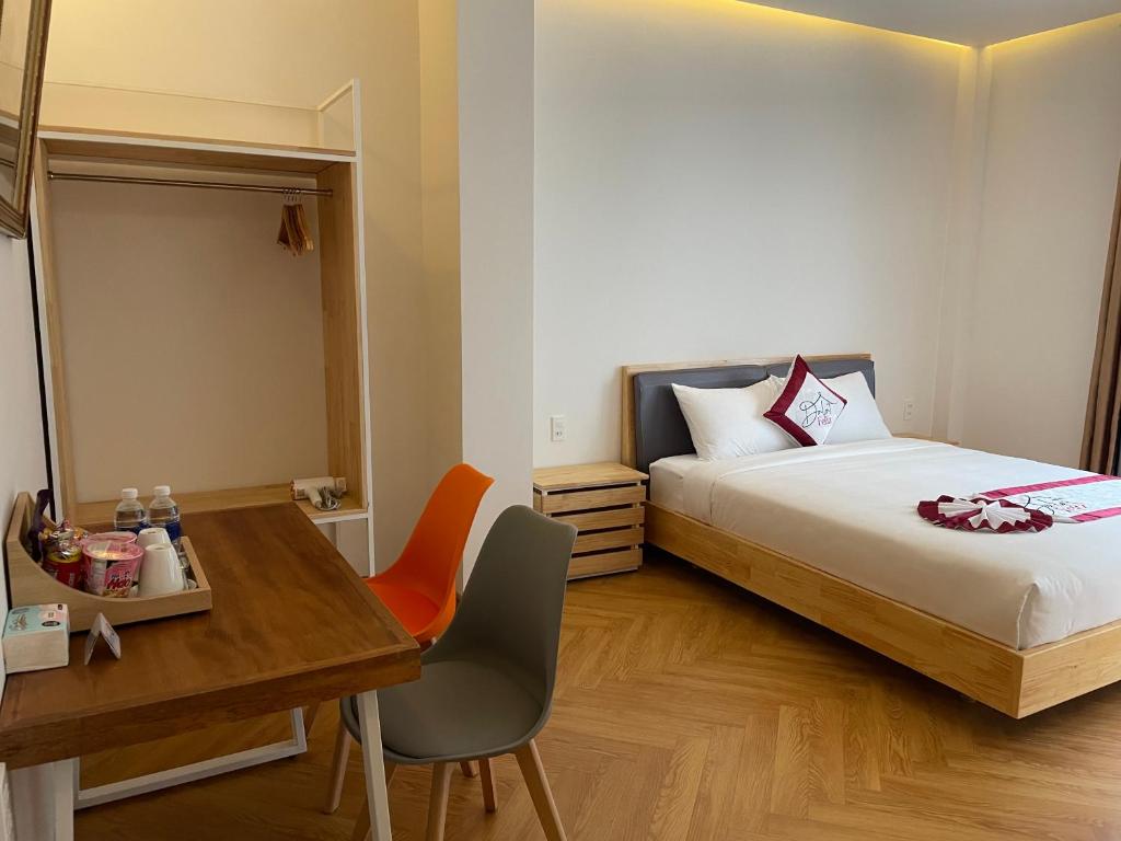 Giường trong phòng chung tại Feliz Dalat Homestay