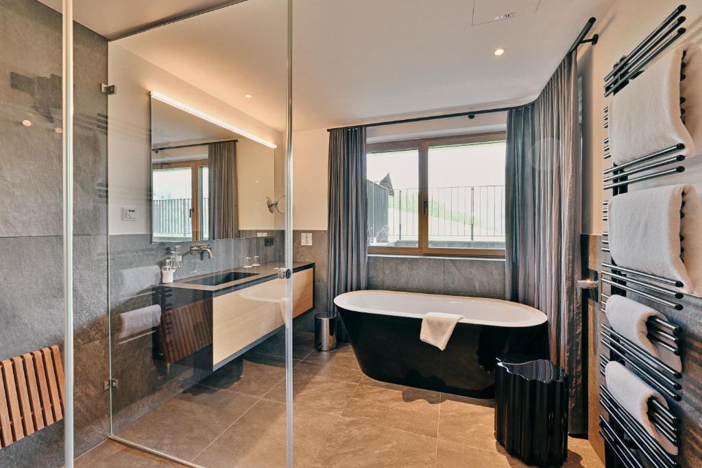 A bathroom at Chalet Hohe Welt - luxury apartments