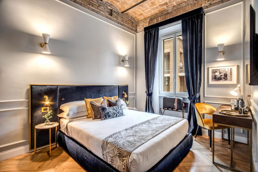 Postel nebo postele na pokoji v ubytování Tree Charme Augusto Luxury Suites