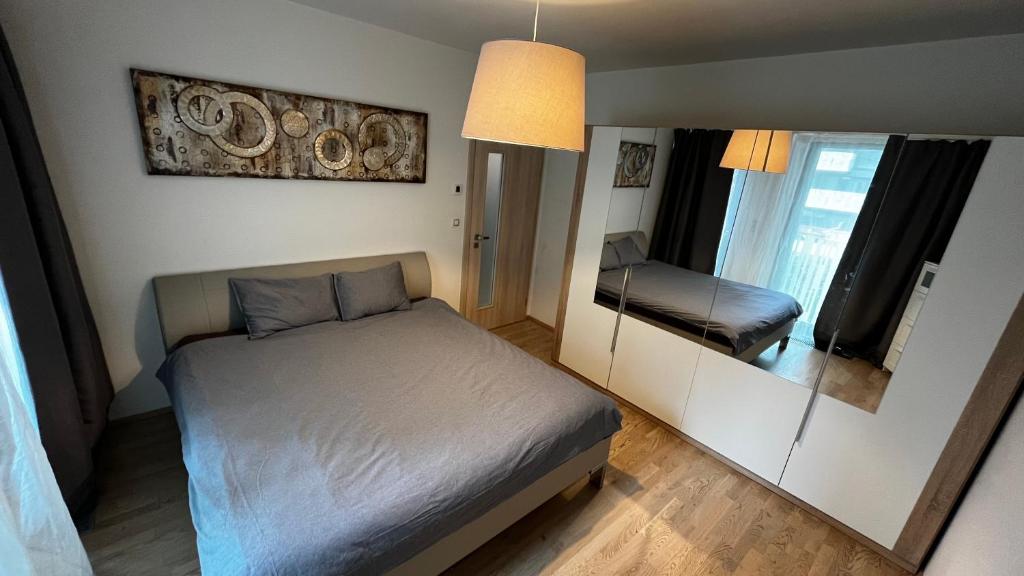 Postel nebo postele na pokoji v ubytování Residence Garden Tower - 8 min do centra, garaz