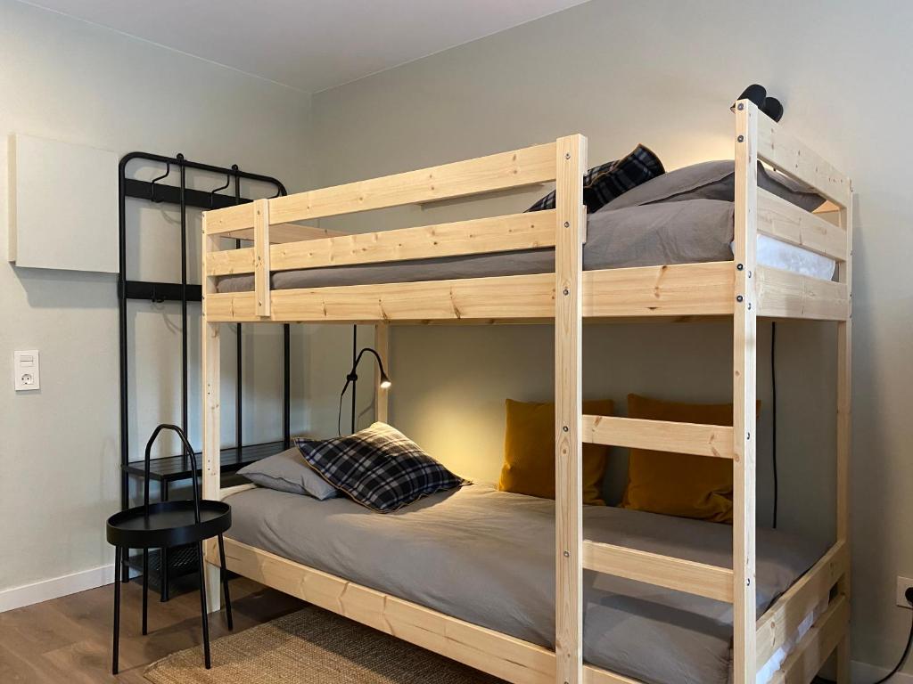 Un pat sau paturi într-o cameră la Estudio reformado Vall d'Incles Grandvalira, 4 pers, max 2 adultos y 2 niños menores 12 años