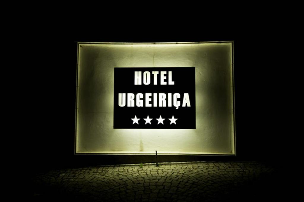 Um certificado, prmio, placa ou documento mostrado em Hotel Urgeirica