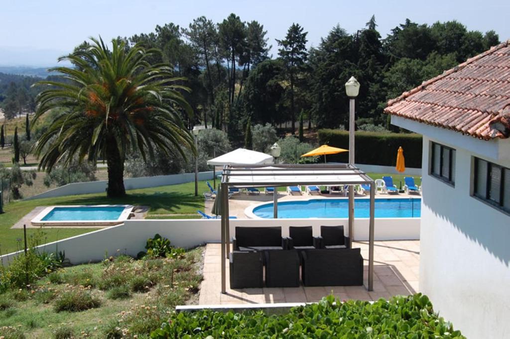 A piscina em ou perto de Hotel Urgeirica