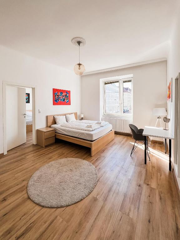 Uma cama ou camas num quarto em Vienna Experience