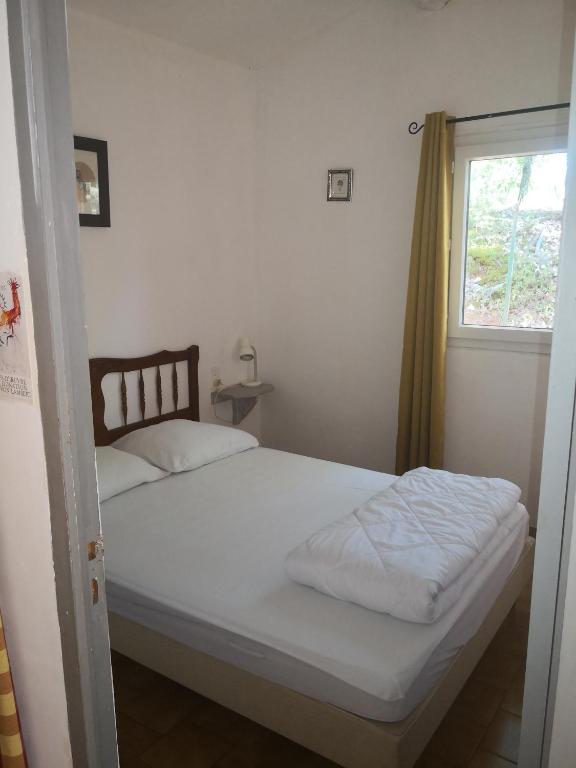 Postel nebo postele na pokoji v ubytování Mes deux Gîtes de l'Ocre
