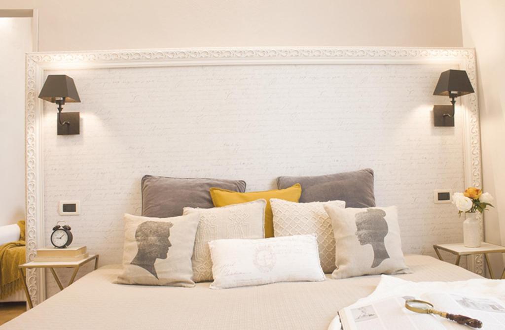 Posteľ alebo postele v izbe v ubytovaní Accanto Al Centro B&B