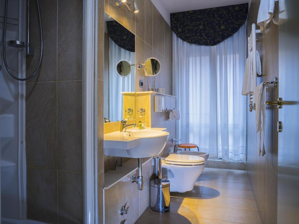 Koupelna v ubytování Hotel Corticella