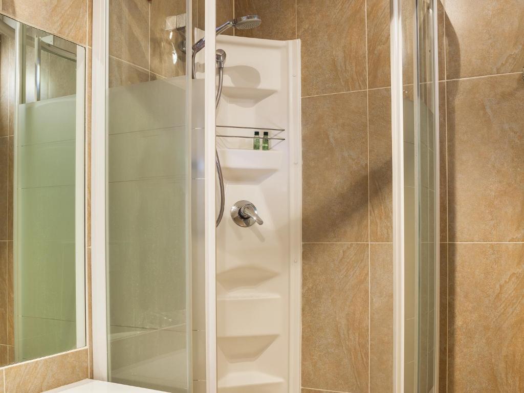 Koupelna v ubytování Hotel Corticella