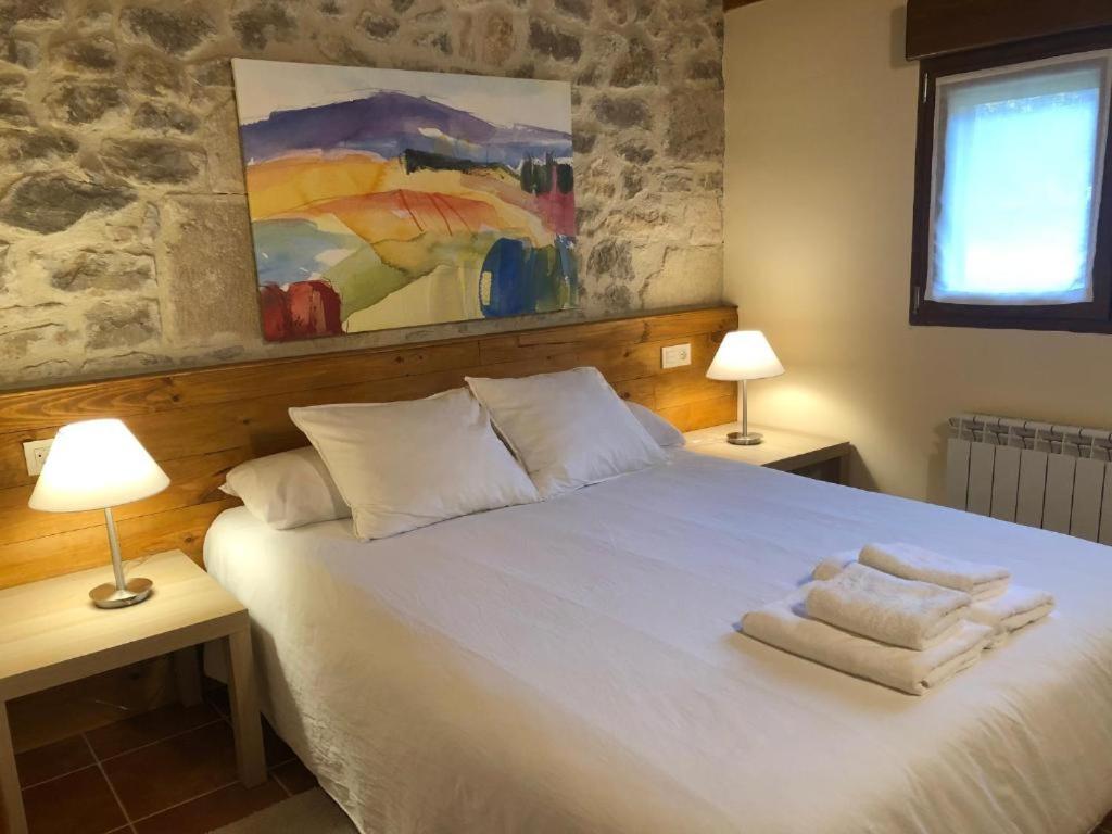 Postel nebo postele na pokoji v ubytování Alojamiento Rural El Molino de Butrera