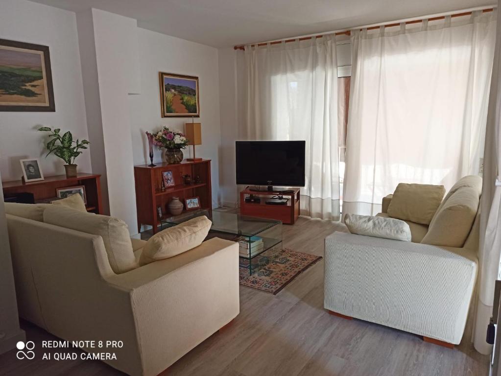 A television and/or entertainment centre at Palamos Carrer Del Mar