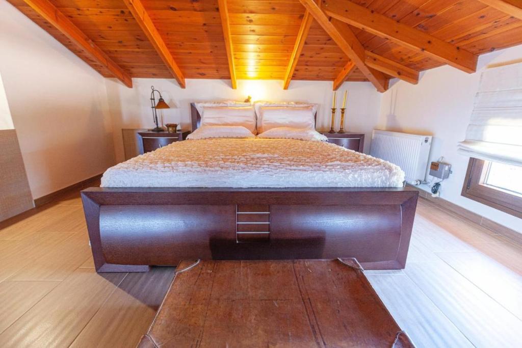 Postel nebo postele na pokoji v ubytování Alcedo Villa